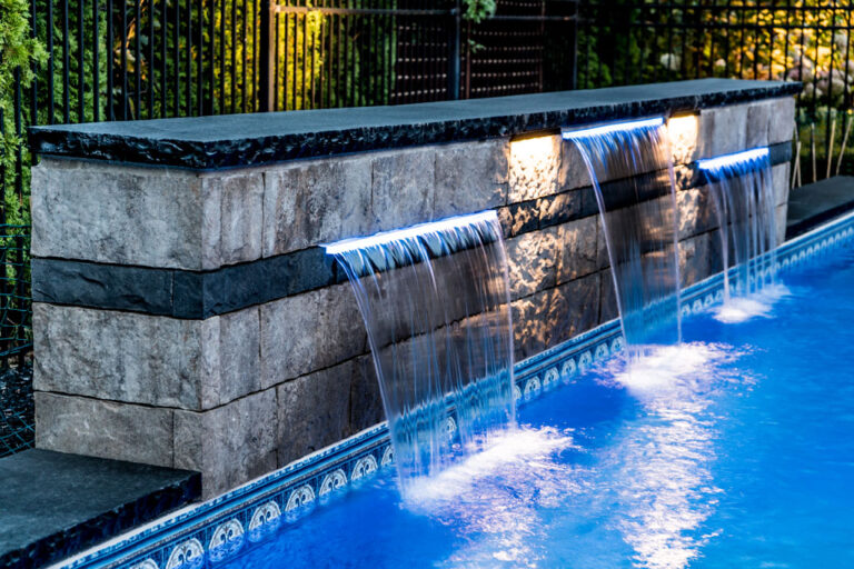 12 Unconventional Waterfall Designs to Elevate Your Backyard Swimming Pool